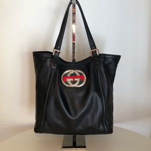 GUCCI black leather tote with “Blondie” logo.